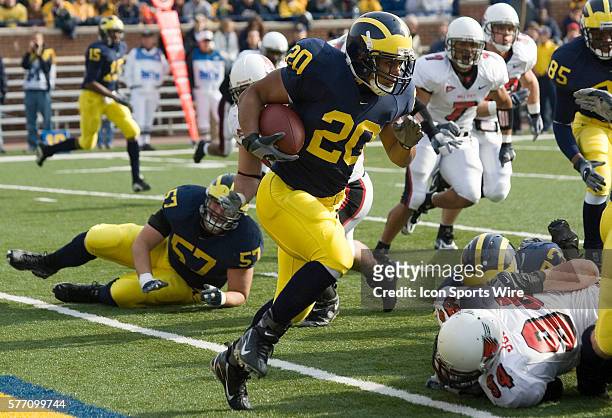 Michigan running back Mike Hart rushes with the ball during No. 2 Michigan's 34-26 win over MAC opponent Ball State at Michigan Stadium in Ann Arbor,...