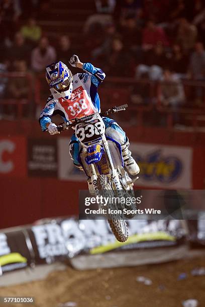 American rider Jason Lawrence pumps his fist as he finishes fifth of his qualifying race during the last day of the 24th Paris Bercy Supercross, in...