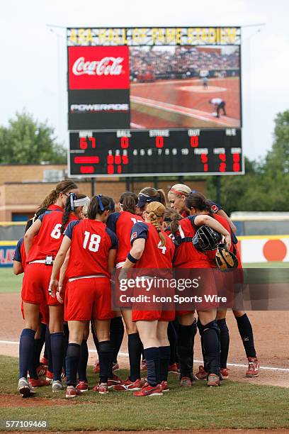 Pitcher Jennie Finch gathers with her team during the KFC World Cup of Softball as team U.S.A. Plays Canada at the ASA Softball Hall of Fame in...