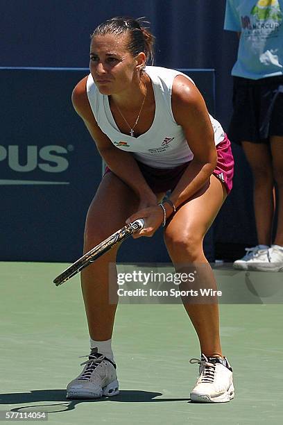 Flavia Pennetta reacts after missing a shot during a semifinal match against Svetlana Kuznetsova at the Mercury Insurance Open played at the La Costa...