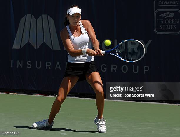Agnieszka Radwanska hitting a return during a match against Svetlana Kuznetsova during the finals of the Mercury Insurance Open played at the La...