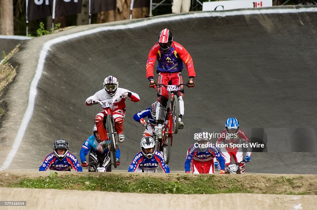 Competitive Bmx Racer Competitors race in the Junior Men Cruiser competition during the ...