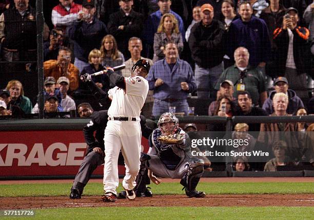 San Francisco Giants' Barry Bonds hits his record-setting 756th career home run in the fifth inning against Washington Nationals pitcher Mike Bacsik...