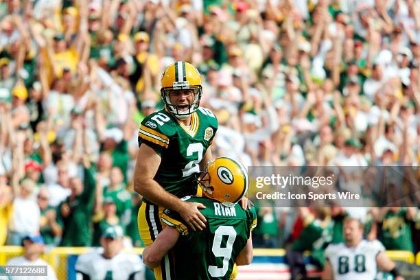 Green Bay Packers place kicker Mason Crosby and holder Jon Ryan celebrate Crosby's 42 yard field goal that defeats the Philadelphia Eagles with six...