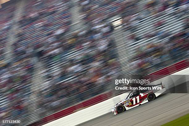 Hampton, GA Denny Hamlin races to turn one for the Emory Healthcare 500 race at the Atlanta Motor Speedway in Hampton, GA.