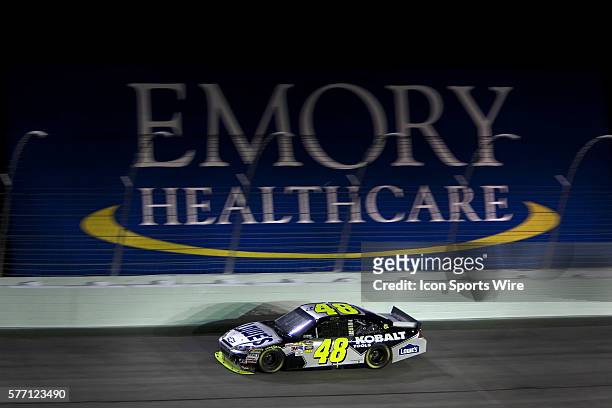 Hampton, GA Jimmie Johnson races off turn one for the Emory Healthcare 500 race at the Atlanta Motor Speedway in Hampton, GA.