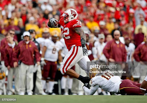 Wisconsin Badgers running back John Clay runs with the ball in game action. The Wisconsin Badgers defeated the Arizona State Sun Devils by the score...