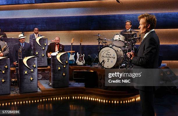 Episode 2094 -- Pictured: Musicians Mark Pender, Jerry Vivino, Scott Healy, Richie Rosenberg, Mike Merritt, Jimmy Vivino, and Max Weinberg with host...