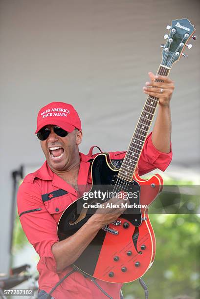 Tom Morello of Prophets of Rage performs at End Poverty Now! rally before marching downtown to RNC on July 18, 2016 in Cleveland, Ohio.