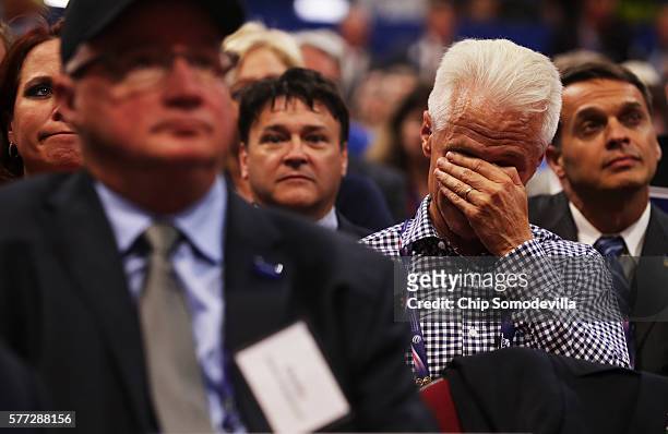 Delegate becomes emotional while listening to the speech of Pat Smith, mother of Sean Smith, one of the four Americans killed in the September 11,...