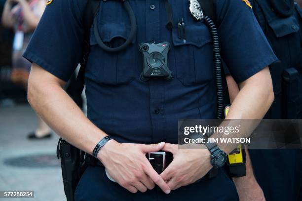 Police officer wears a body camera on during an anti-Donald Trump protest in Cleveland, Ohio, near the Republican National Convention site July 18,...