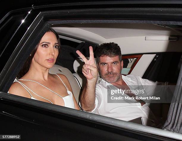 Lauren Silverman and Simon Cowell leaving the Syco summer party at St James' Palace on July 18, 2016 in London, England.