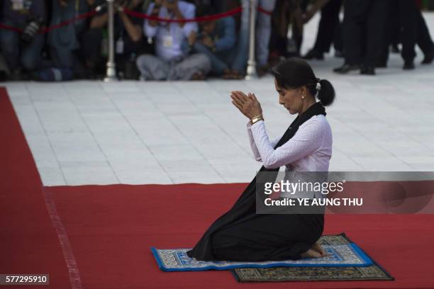 Myanmar State Counsellor and Foreign Minister Aung San Suu Kyi pays her respects to her late father, Myanmar independence hero General Aung San,...