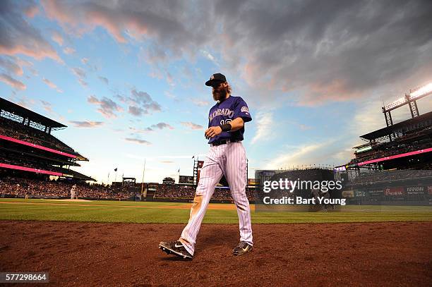 Charlie Blackmon of the Colorado Rockies walks off the field in the sixth inning against the Tampa Bay Rays at Coors Field on July 18, 2016 in...