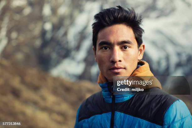 portrait of gurkha man from nepal himalayas - porter stock pictures, royalty-free photos & images