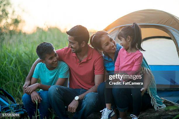 camping together as a family - asian family camping stock pictures, royalty-free photos & images