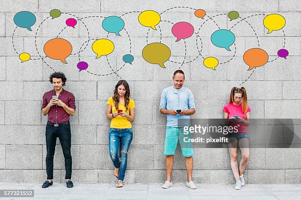 social people - gossip stock pictures, royalty-free photos & images