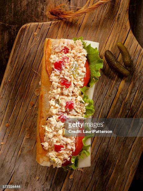 tuna salad sandwich on a baguette - tuna salad stock pictures, royalty-free photos & images