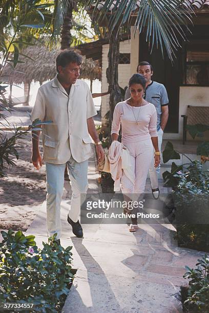 Actors Elizabeth Taylor , Stanley Baker and Richard Burton , Puerto Vallarta, Mexico, 12th January 1964. Burton is in Mexico for location filming on...