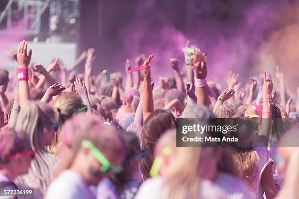 people celebrating the holi festival in oslo. - dance this way launch party stock pictures, royalty-free photos & images