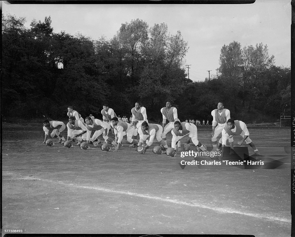 Members of Westinghouse High School football team, front row from