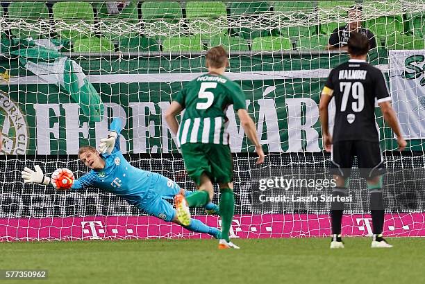 Goalkeeper Denes Dibusz of Ferencvarosi TC can't save the penalty shot from Bence Iszlai of Swietelsky Haladas during the Hungarian OTP Bank Liga...