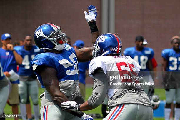 New York Giants tackle Will Beatty and New York Giants defensive end Jason Pierre-Paul battle during training camp at the Timex Performance Center in...