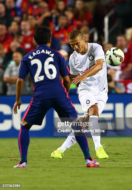 Shinji Kagawa of Manchester United defends against Nemanja Vidic of Inter Milan during an International Champions Cup match at Fedex Field, in...
