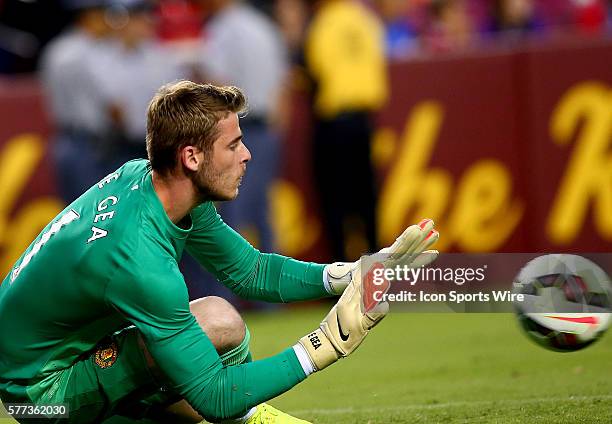 David De Gea of Manchester United gets down to make a save against Inter Milan during an International Champions Cup match at Fedex Field, in...