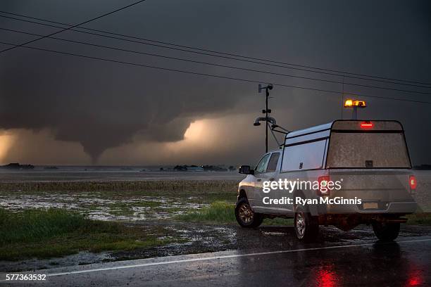 research vehicle in front of tornado - doppler stock pictures, royalty-free photos & images