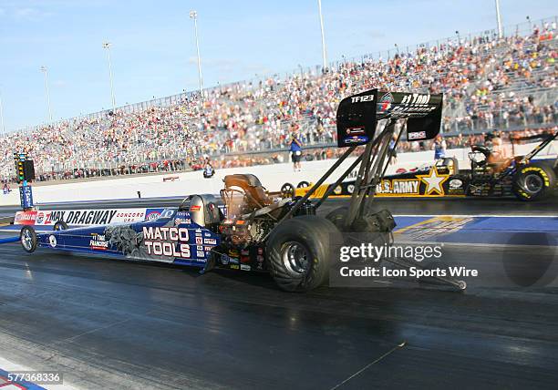 Antron Brown and Tony Schumacher during the final round of the NHRA Carolina Nationals at the zMAX Dragway in Concord, NC.