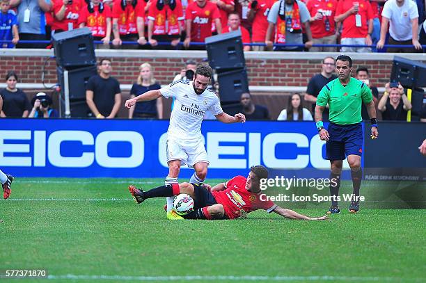 Real Madrid defender Daniel Carvajal and Manchester United midfielder Anderson during the Real Madrid v Manchester United match Saturday afternoon,...