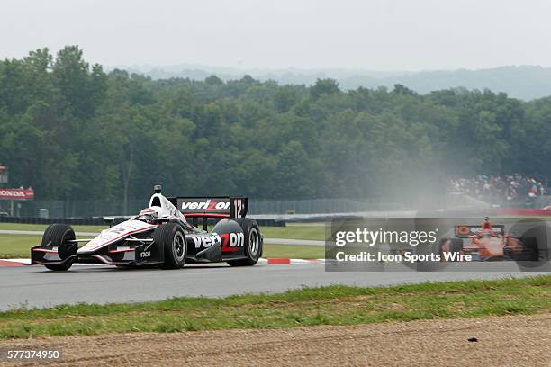 IndyCar Driver Will Power is followed by IndyCar Driver Simon Pagenaud during the Qualifications for The Honda Indy 200 at the Mid-Ohio Sports Car...