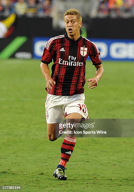 Milan forward Keisuke Honda runs down field in the Guinness International Championship Cup being played at Bank of America Stadium in Charlotte,NC....