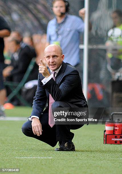 August 03, 2014 - Portland Thorns FC head coach Paul Riley directs his team from the sideline during a NWSL match between the Portland Thorns FC and...