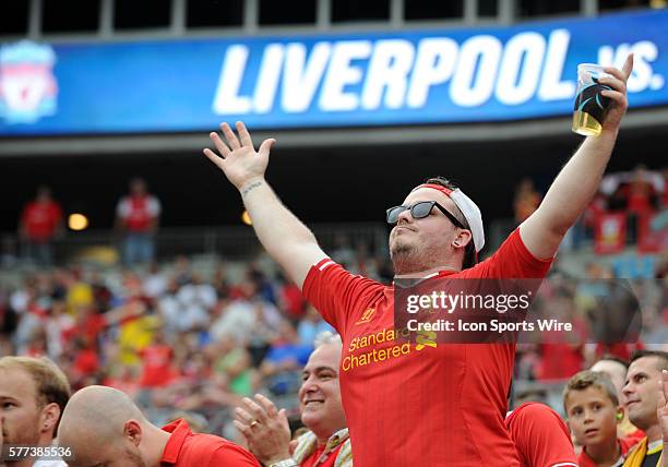 Liverpool F.C. Fan cheers during the match against A.C. Milan at Bank of America Stadium in Charlotte,NC.