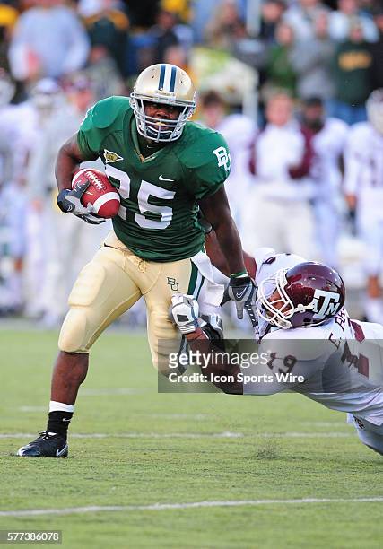 Baylor running back Jacoby Jones Texas A&M DL Eddie Brown in action during the NCAA Football game between the Baylor Bears and the Texas A & M Aggies...