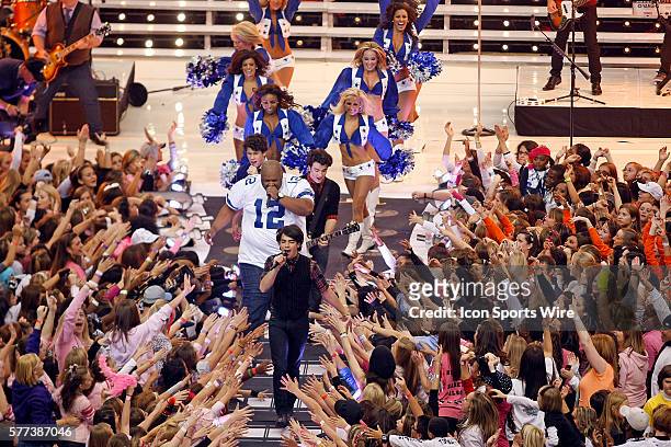 November 2008 - The Jonas Brothers perform at halftime of the Thanksgiving day game between the Dallas Cowboys and the Seattle Seahawks at Texas...