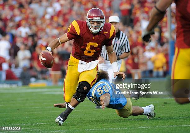 Defensive tackle Chase Moline can't get to USC quarterback Mark Sanchez as he picks up a first down in the third quarter during a game at the Rose...