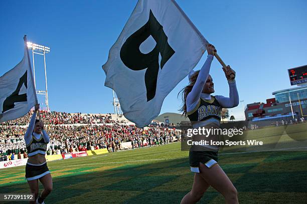 Cheerleaders run with flags after the Rams score a game sealing touchdown. The Colorado State Rams defeat the Fresno State Bulldogs 40-35 in the New...