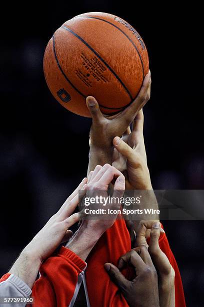 The Ohio State Buckeyes team holds up a basketball during the Ohio State Buckeyes 83-59 win over the North Carolina-Asheville Bulldogs at Value City...