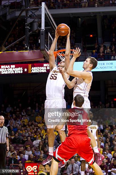 Minnesota Gophers center Elliott Eliason rebounds against Ohio State Buckeyes at Williams Arena in Minneapolis, MN.