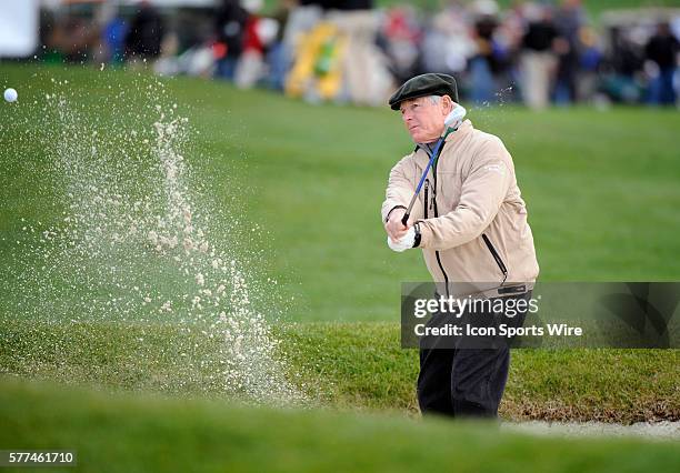 Charles Schwab hits out of a bunker on the Pebble Beach course during the third round of the AT&T Pebble Beach National Pro-AM golf tournament at...