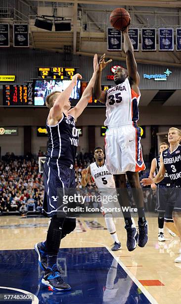 Gonzaga senior center Sam Dower shoots over BYU freshman forward Eric Mika during the WCC Conference game between the Brigham Young University...