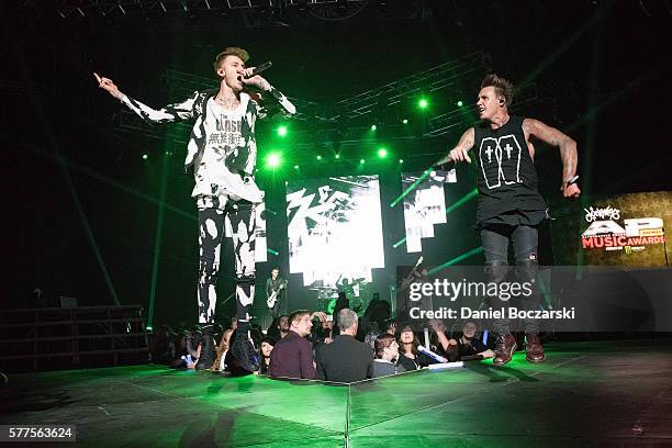 Machine Gun Kelly and Jacoby Shaddix of Papa Roach perform during the Alternative Press Music Awards 2016 at Jerome Schottenstein Center on July 18,...