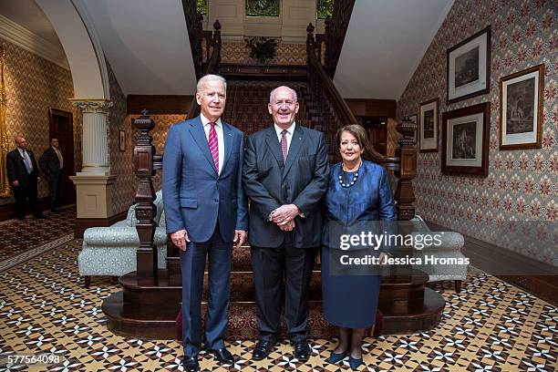 Vice-President Joe Biden, Governor General Peter Cosgrove and Lady Lynne Cosgrove stand pose for a photo before dinner at Admiralty House, Kirribilli...