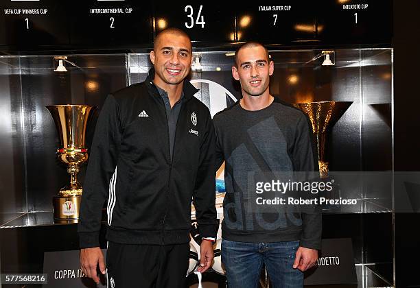 David Trezeguet and captain of Melbourne Victory Carl Valeri pose during a Juventus FC player visit to the Bourke Street adidas store on July 19,...