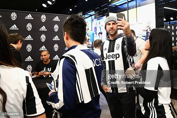 David Trezeguet signs autographs for fans during a Juventus FC player visit to the Bourke Street adidas store on July 19, 2016 in Melbourne,...