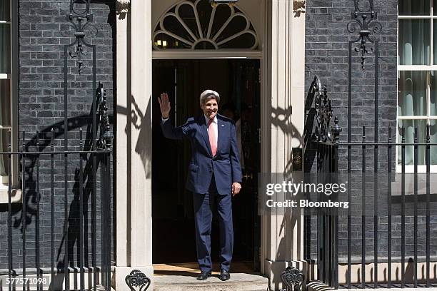 John Kerry, U.S. Secretary of State, gestures as he arrives for a meeting with U.K. Prime Minister Theresa May at 10 Downing Street in London, U.K.,...