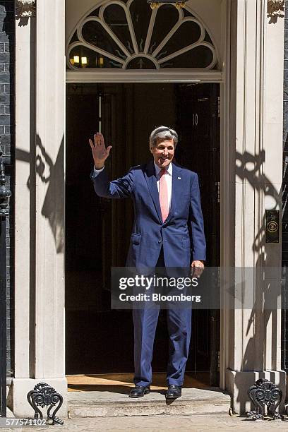 John Kerry, U.S. Secretary of State, gestures as he arrives for a meeting with U.K. Prime Minister Theresa May at 10 Downing Street in London, U.K.,...